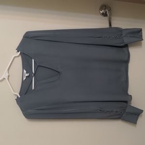 Criss cross covered button long sleeve blouse